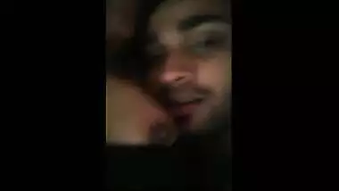 College teen girl grabs lover’s head to suck nipple
