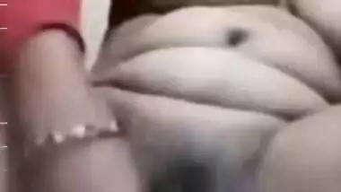 Young guy masturbating watching Bhabhi dildoing on VC