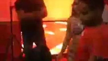 Shoving money in chaddi of the girl dancing mujra