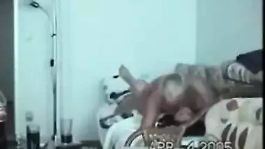 Young indian girl teaching indian how to wear a...