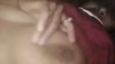 Lecherous Desi gal demonstrating her tits online under the blanket